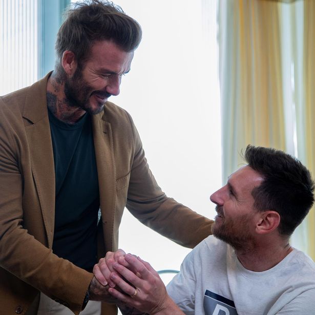 David Beckham shakes hands with Lionel Messi