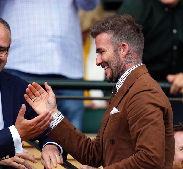 David Beckham proudly showed off his intricate inkwork during his trip to Wimbledon on Wednesday, including a palm tattoo designed by his daughter Harper