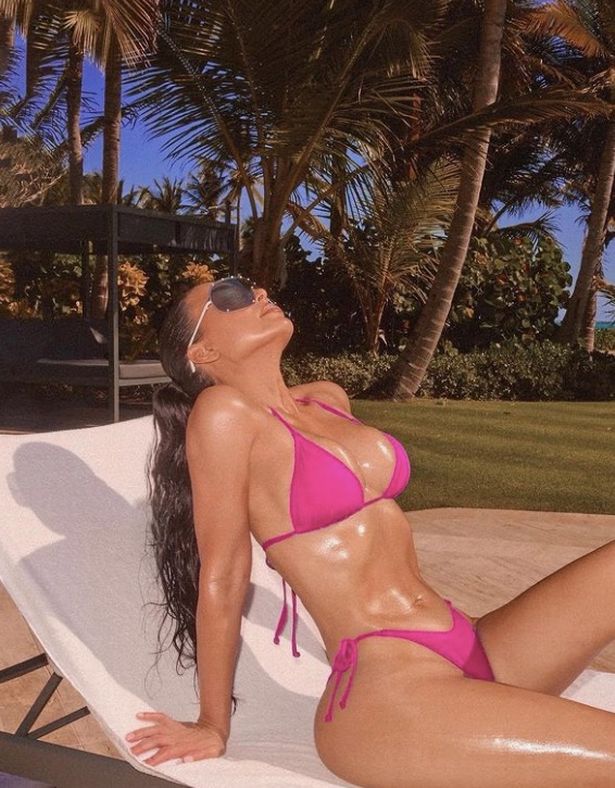 Kim Kardashian wows in tiny pink bikini during sun-soaked holiday - OK!  Magazine