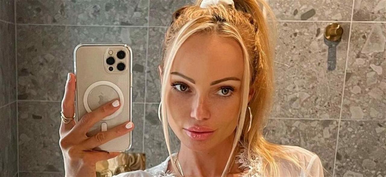 Abby Dowse Flaunts ‘Strawberry Face’ In Leather Lingerie