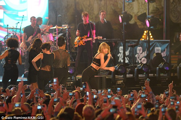 Giving it her all: TSwift certainly appeared to excite the crowd with her award-winning vocals