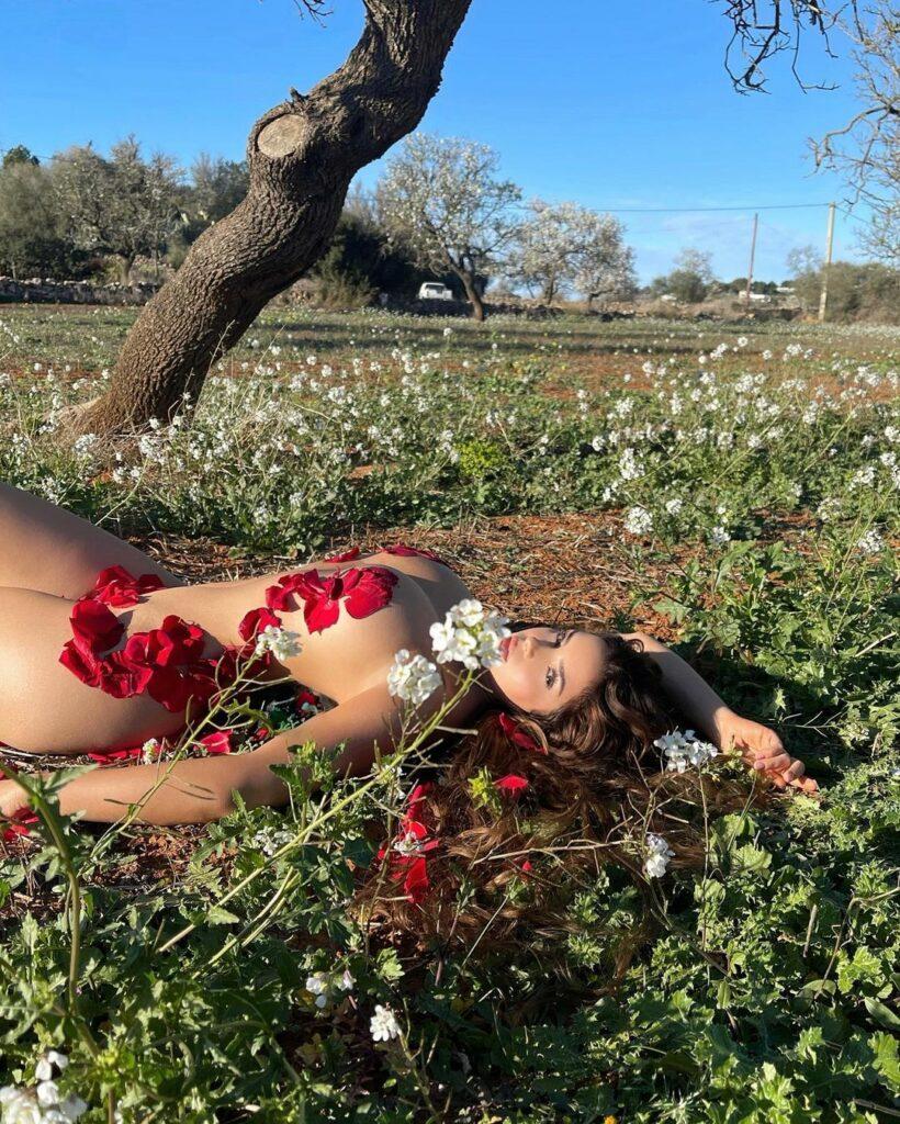 Demi Rose posing for the camera.