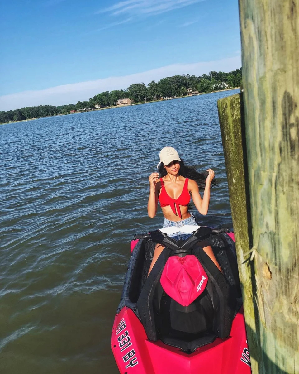 We see you! The brunette beauty’s red bikini top perfectly matched her jet ski.