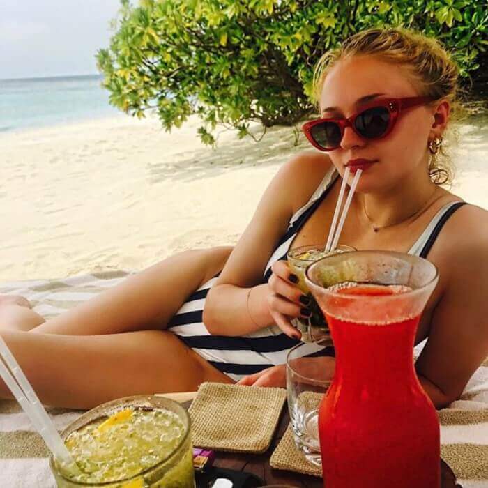 united-kingdom-actress-Sophie-Turner-wearing-Striped-One-Piece-bikini-Swimsuit