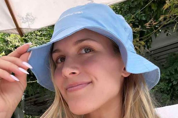 Tennis darling Eugenie Bouchard celebrated Canada Day in style as she donned a elegant blue bikini while relaxing on a sun lounger