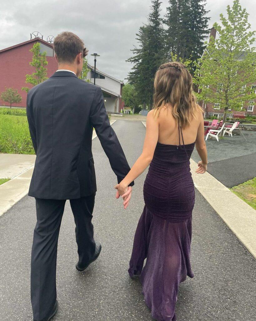 Ella Wahlberg and her prom date posing for the camera.