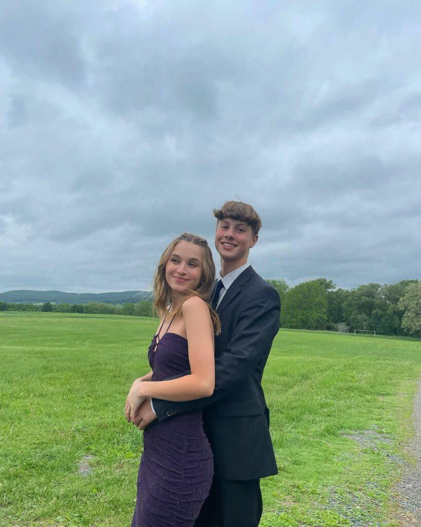 Ella Wahlberg and her prom date posing for the camera.