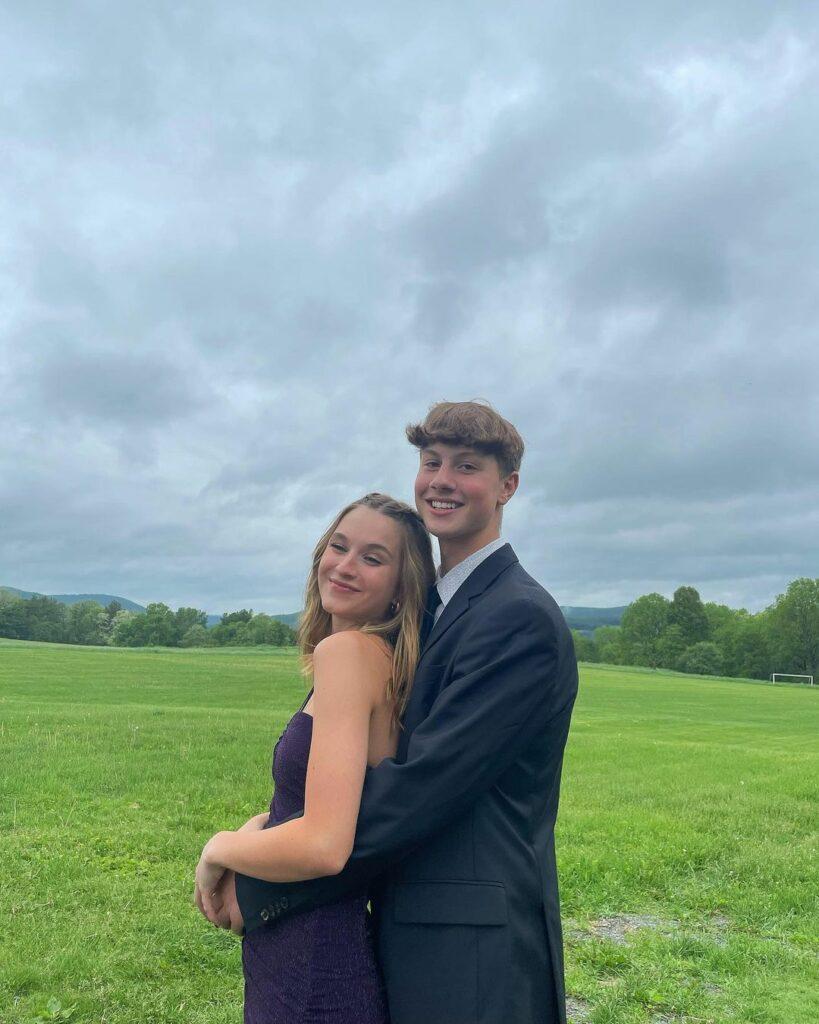 Ella Wahlberg and her prom date posing for the camera.