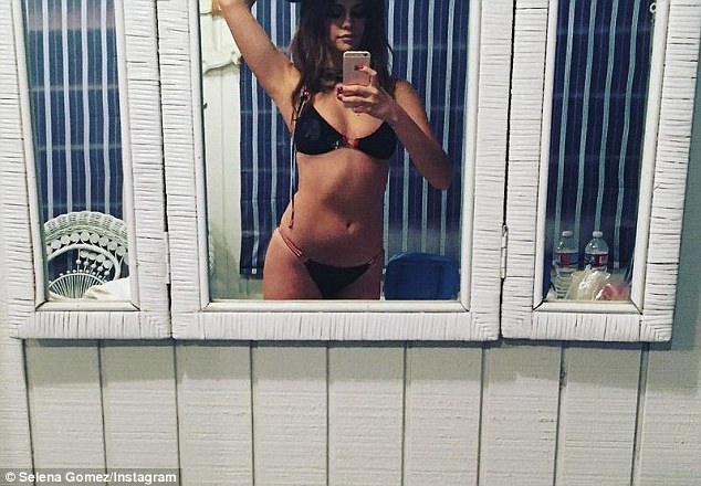 Toned: In Devember, The Heart Wants What It Wants singer showed off her amazing bikini body in a mirror selfie she shared to her 58.7 million Instagram followers