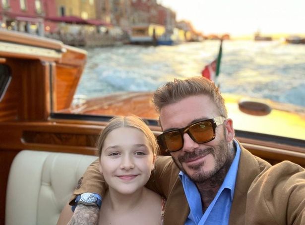 David and Harper in a cute picture whilst taking a water taxi in Venice