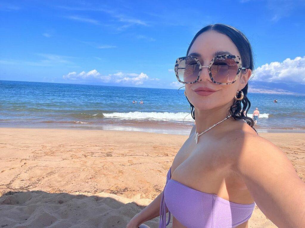 Vanessa Hudgens taking a selfie at the beach.