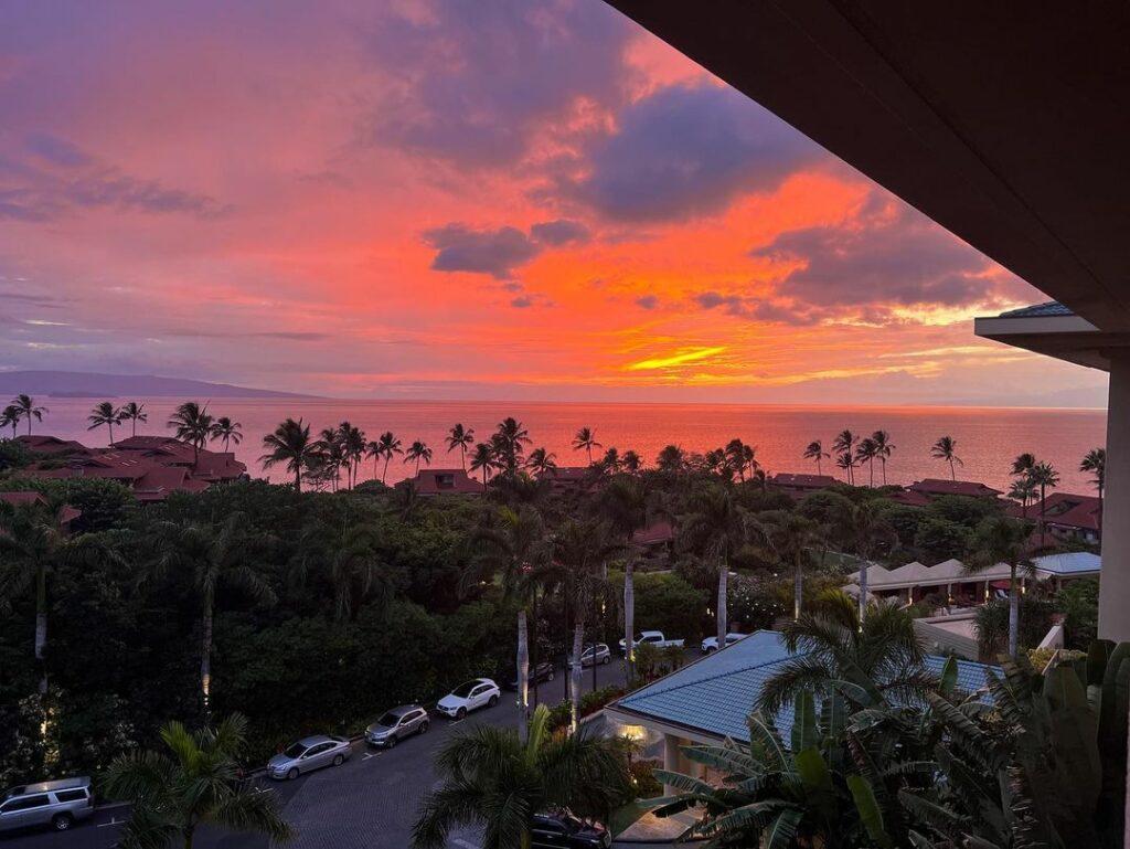 Vanessa Hudgens taking a photo of the sunset in Hawaii.