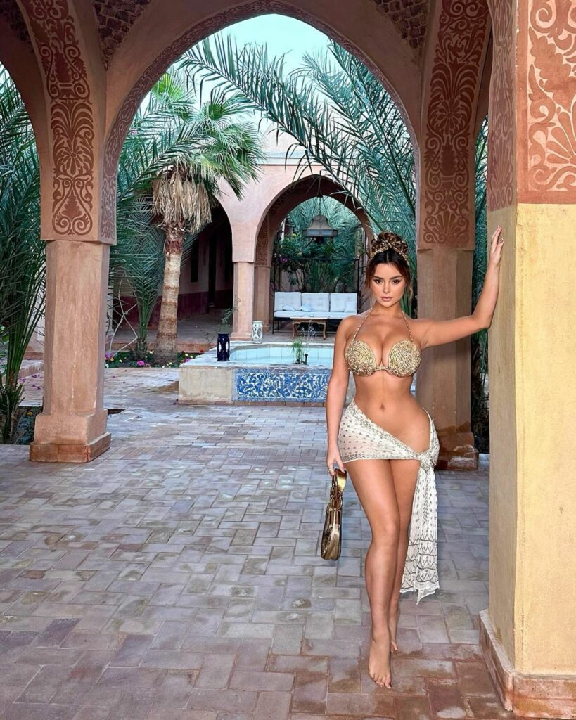 Demi Rose posing fo rue camera.