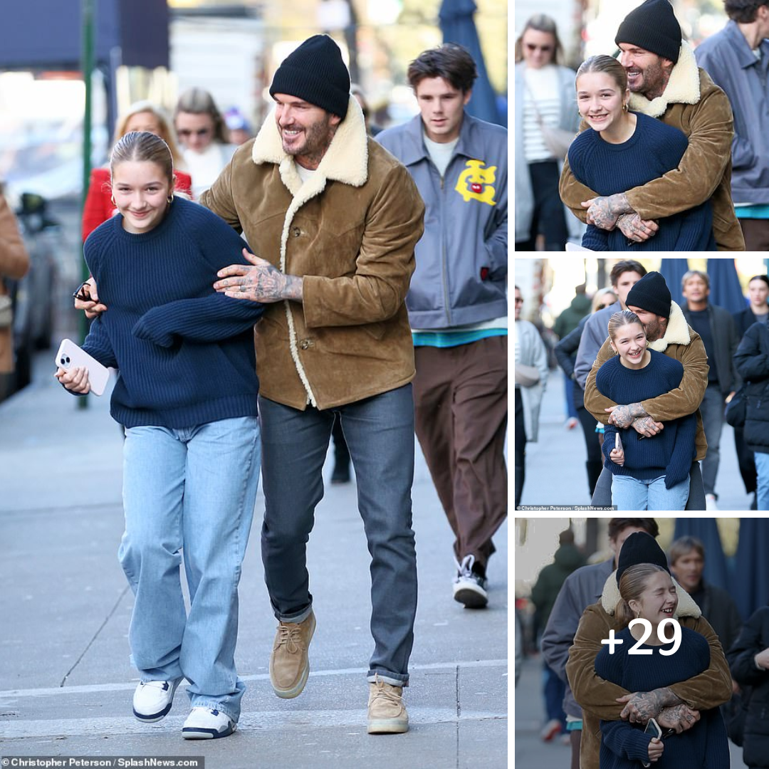 David Beckham larks about with his daughter Harper, 12, as he gives her a bear hug while out walking on their festive trip to New York