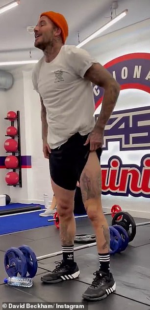 Steady on Becks: David Beckham showed off a pair of muscular legs while taking a breather between sets during his latest visit to a local branch of F45 Training in London on Thursday