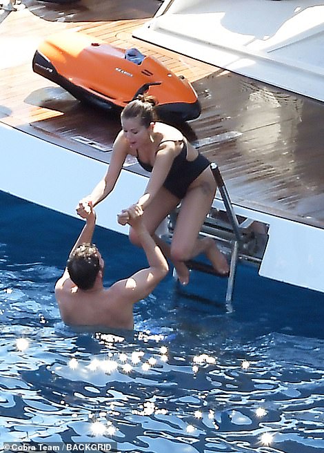 Day out: The pair appeared to have the time of their lives during the yacht trip