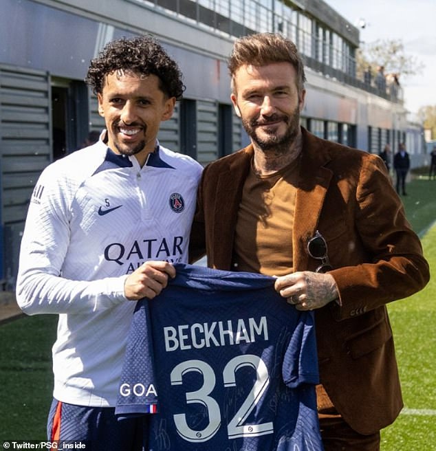 He smiled as he held up this season's jersey with his name and old squad number on the back