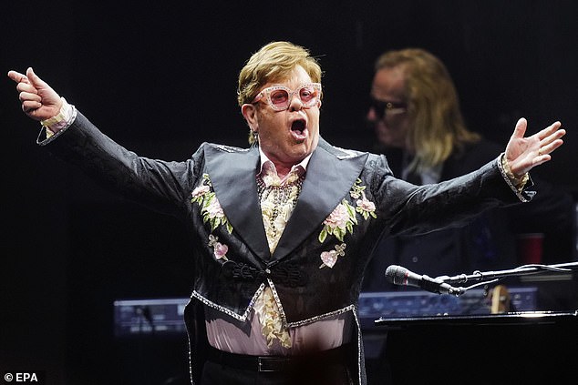 Born to perform: Sir Elton, 76, performed the last of his shows at London's O2 Arena on Tuesday, with the star retiring from gigging after Goodbye Yellow Brick Road tour in July (pictured on stage in Barcelona, Spain last week)