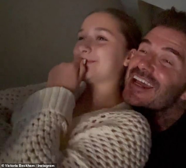 Making music: David Beckham, 48, and his daughter Harper, 11, put on an adorable display as they sung along with Sir Elton John at his final gig at the O2 Arena in London on Tuesday