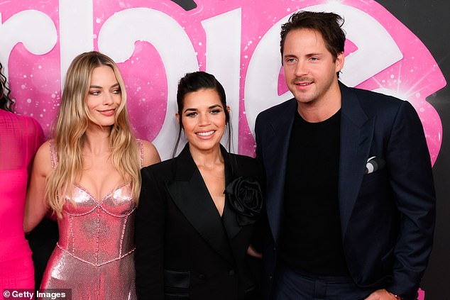 Margot's husband Tom Ackerley (right) was on hand to celebrate his wife's success