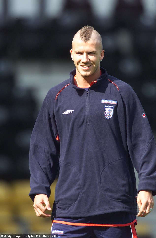 Experimental: David Beckham has worked his way through a plethora of hairstyles during his time in the public eye (pictured with a mowhawk in 2001)