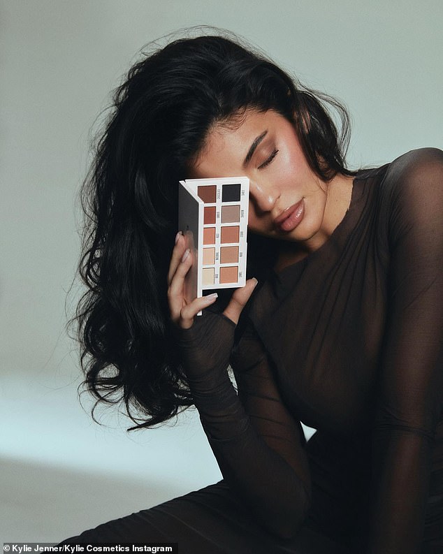 New product: Later in the day, she launched a new eyeshadow palette with ten matte shades on the official Instagram page of her beauty brand, Kylie Cosmetics. She looked stunning in a monochromatic brown makeup look featuring a cat-eye look and glossy lip. In the photo, she put on a sultry display in a sheer black dress