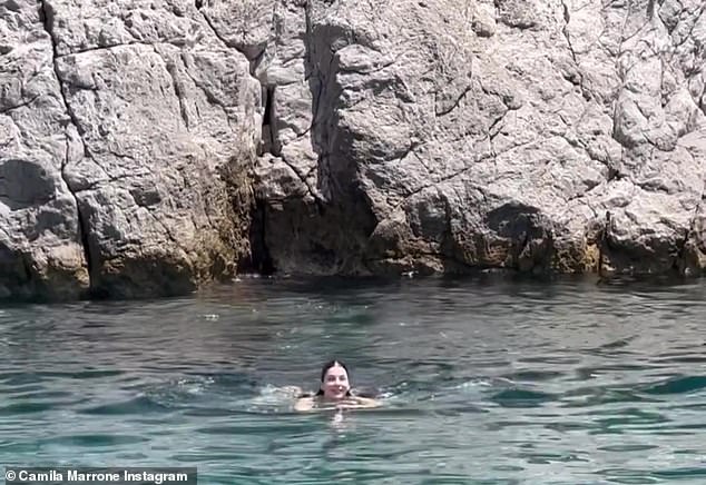 Dip in the ocean: Footage from the 26-year-old's Instagram video showed her swimming in the clear blue ocean waters of the Amalfi coast