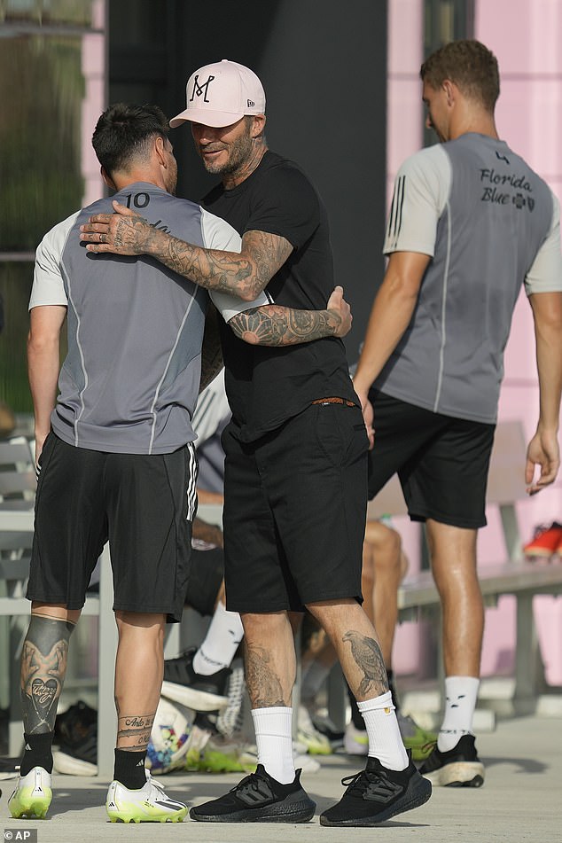 The Argentine international and ex-England captain hugged in front of Messi's teammates