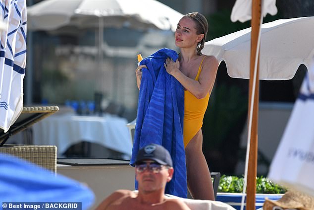 Holiday: Kimberley dried off with a blue towel after spending the day at the beach