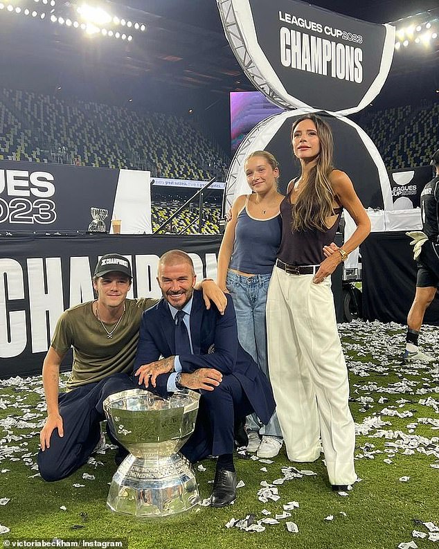 The reel of photos began innocently enough with a happy family photo of Victoria and David posing with their two youngest children, Cruz and Harper