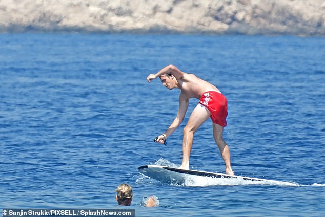 Steady! He practiced his balance as he jetted around on the fliteboard