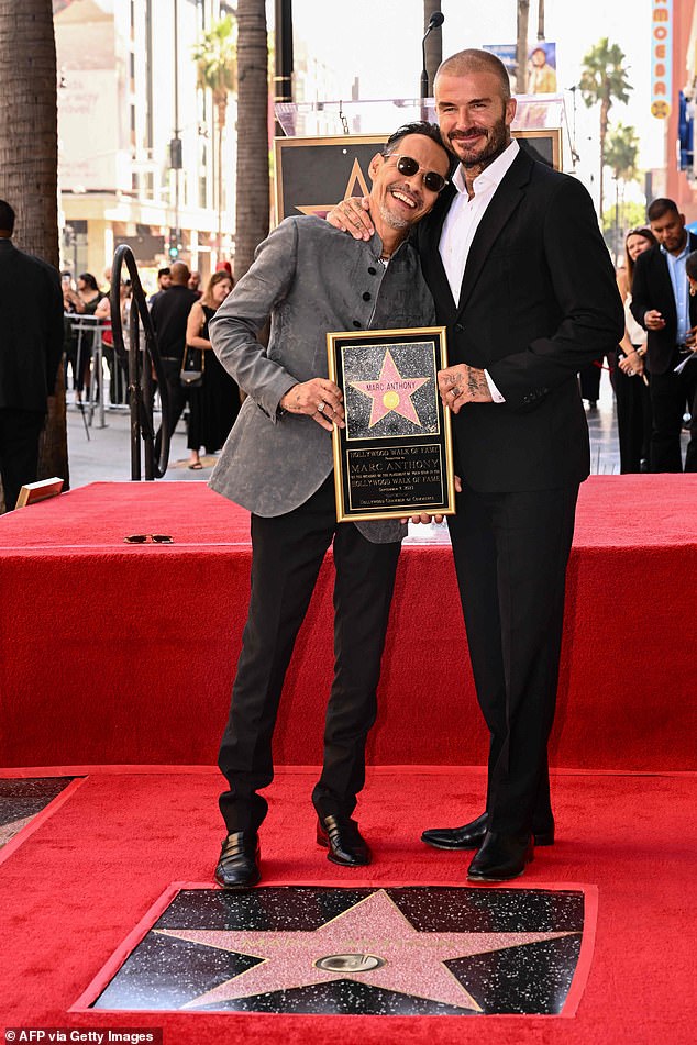 Proud bestie: The global athletic superstar David Beckham watched proudly as Marc accepted his star on the Hollywood Walk of Fame; seen Thursday