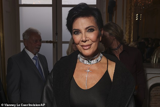 Glam: Kris rocked a glitzy silver choker