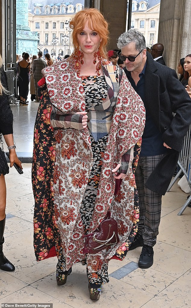 Daring: Christina finished off her look with enormous oversized red earrings