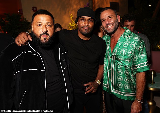 Busy night: Mike Gardne (centre) opted for a black T-shirt as he joined the DJ and David