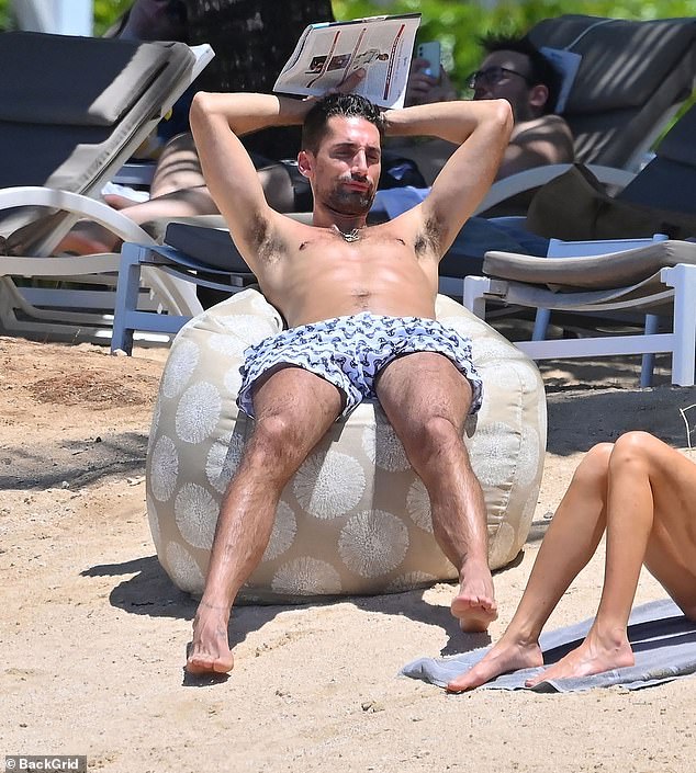 Millie Mackintosh showcases her jaw-dropping figure in a sexy cream bikini while husband Hugo Taylor flaunts his buff body in Mauritius