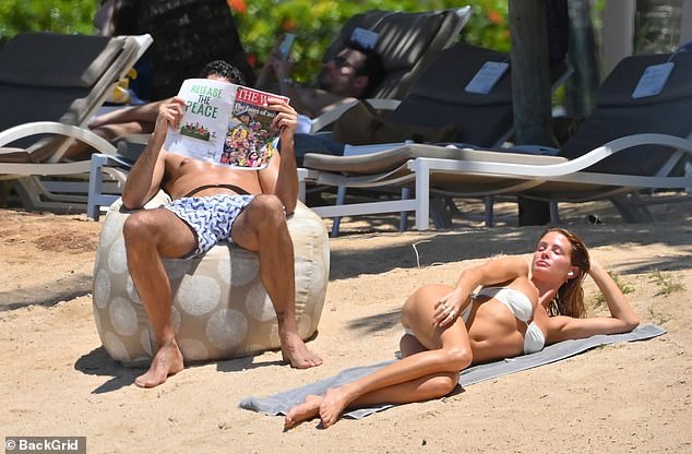 Millie Mackintosh showcases her jaw-dropping figure in a sexy cream bikini while husband Hugo Taylor flaunts his buff body in Mauritius