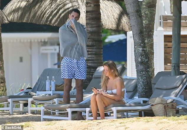 Millie Mackintosh showcases her jaw-dropping figure in a sexy cream bikini while husband Hugo Taylor flaunts his buff body in Mauritius