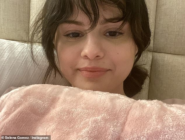 Selena Gomez shares a number of fun throwback snaps including a selfie with younger sister Gracie, 10, ahead of New Year's Eve: 'Moments in time'