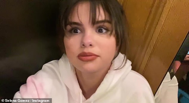 Selena Gomez shares a number of fun throwback snaps including a selfie with younger sister Gracie, 10, ahead of New Year's Eve: 'Moments in time'