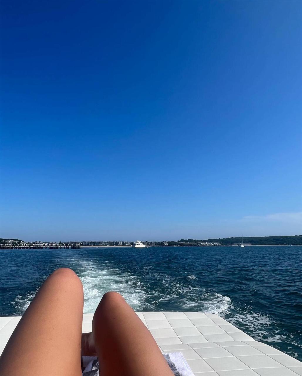 Alix Earle Stretches Out On The Boat In Her Little Bikini