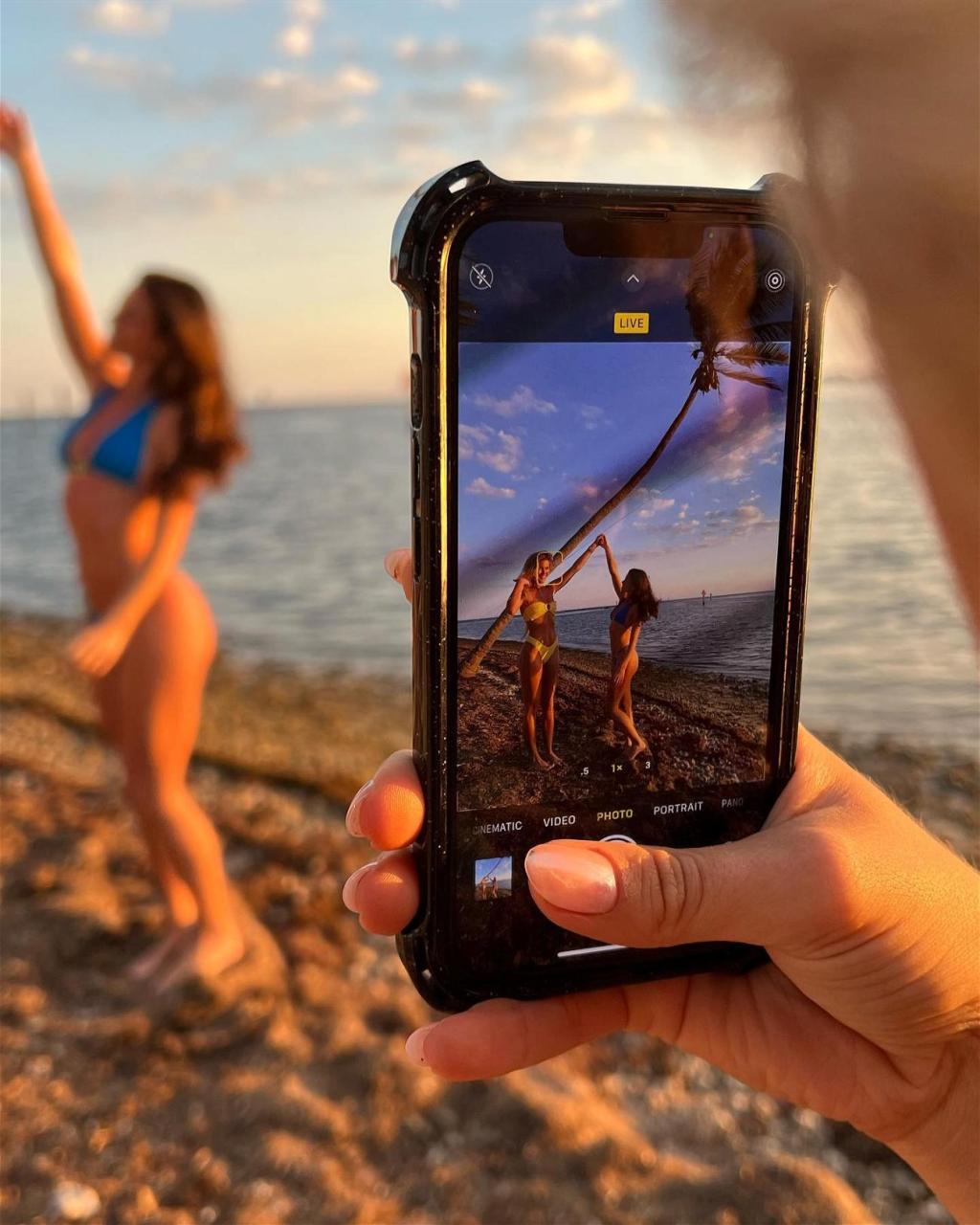 Alix Earle and friends have fun on the beach in a blue bikini