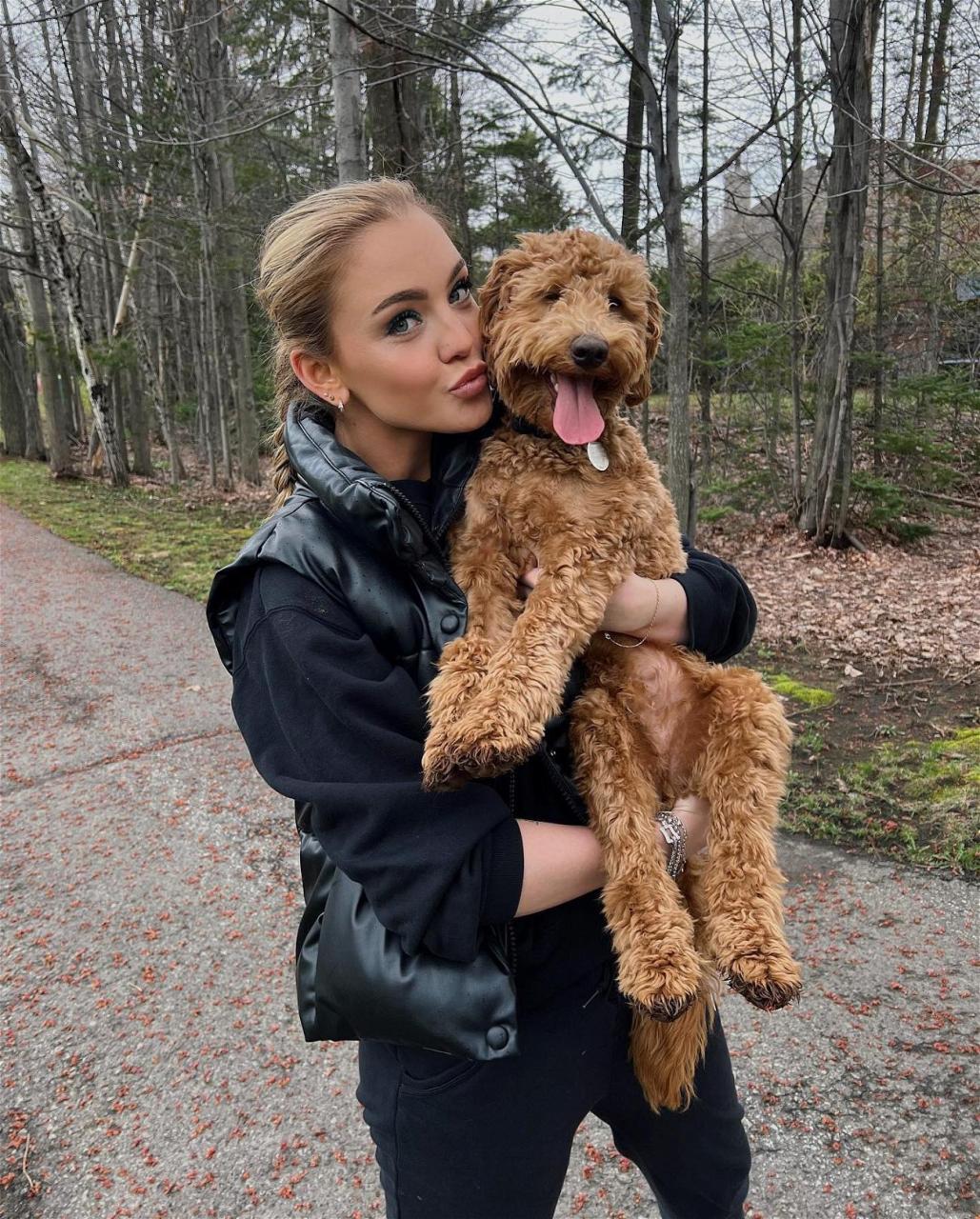 Charlotte poses with her dog