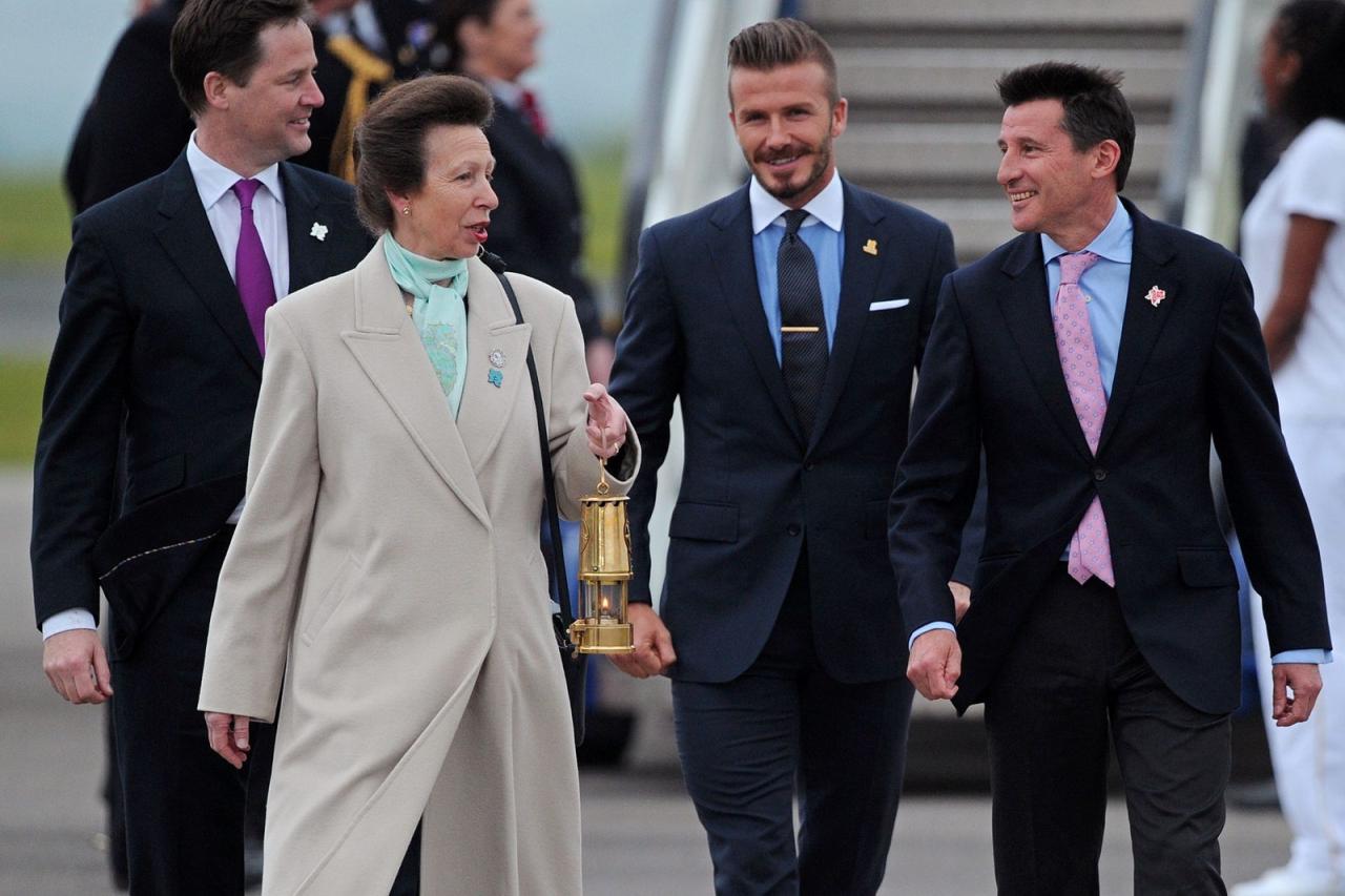 Image may contain David Beckham Anne Princess Royal Sebastian Coe Tie Accessories Accessory Human Person and Coat