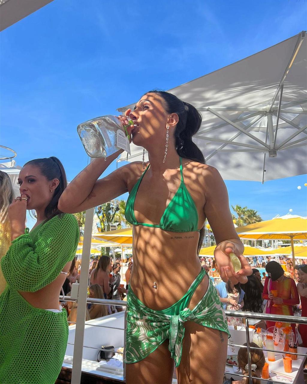 Emily Faye Miller Parties In Ibiza In A Little Green Bikini