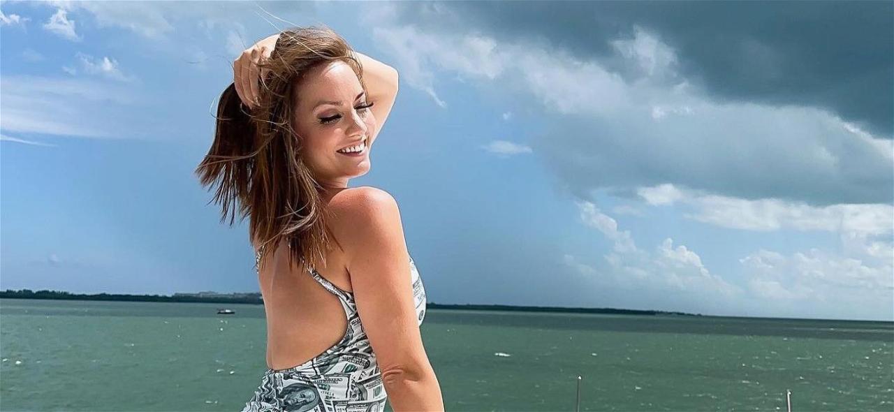 Former Pastor Nikole Mitchell Jumps Off The Boat In Her Black Bikini