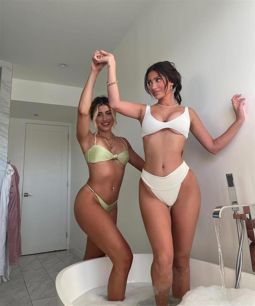 Francesca Farago in the tub with a friend