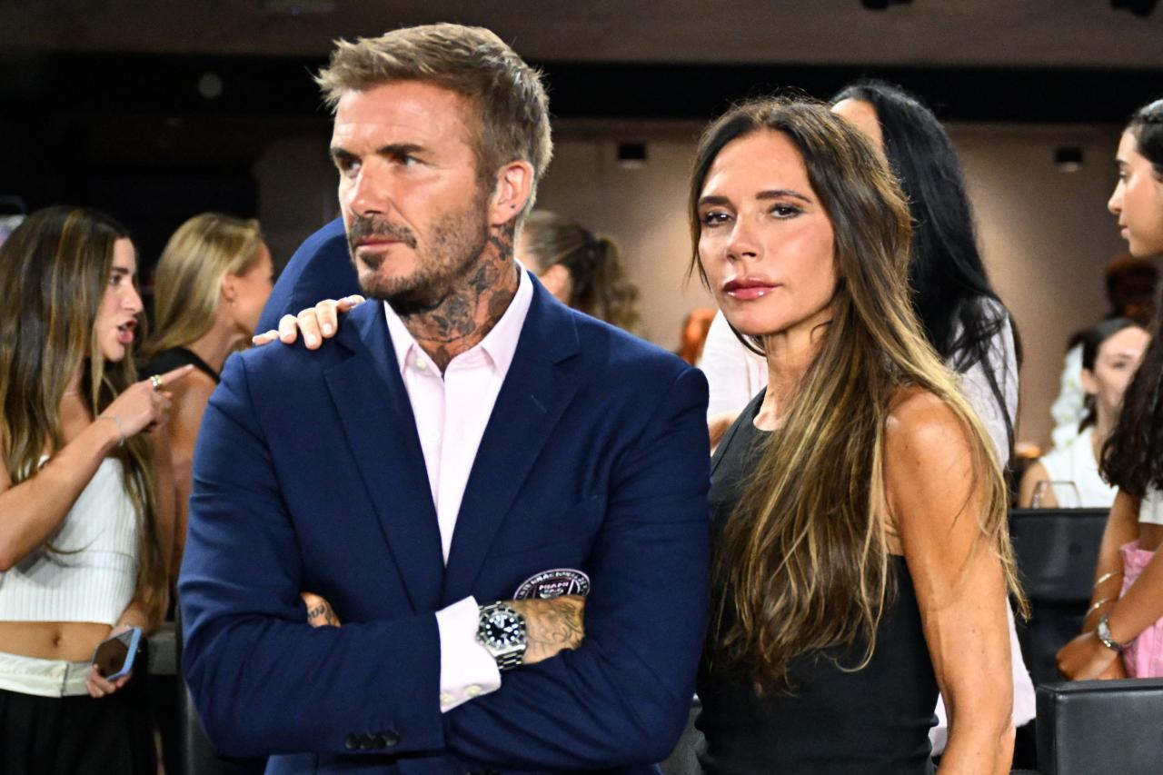 Inter Miami's co-owner David Beckham and his wife, English fashion designer Victoria Beckham look on ahead of the round of 32 Leagues Cup football match between Inter Miami CF and Orlando City SC at DRV PNK Stadium in Fort Lauderdale, Florida, on August 2, 2023. (Photo by CHANDAN KHANNA / AFP) (Photo by CHANDAN KHANNA/AFP via Getty Images)