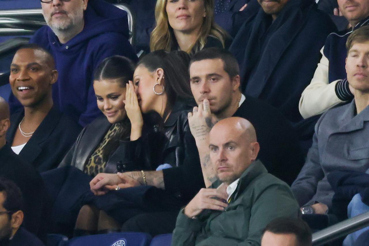 Selena Gomez is seen chatting with Peltz Beckham as Brooklyn watches the match between Paris Saint-Germain and Olympique de Marseille at Parc des Princes on Sept. 24, 2023 in Paris, France. 