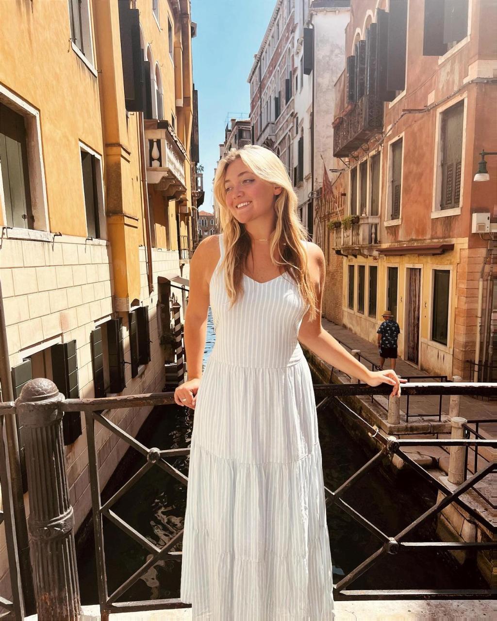 Julz Dunne in a white dress in Venice